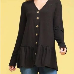 Solid black tunic with buttons all the way down the front. Fits true to size.